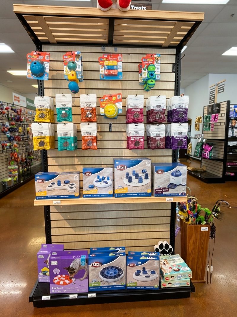 Trixie, Chuckit! and Outward Hound puzzle toys on an endcap